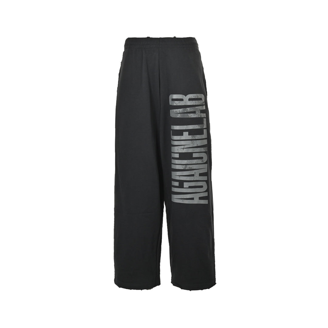 Reverse lettering distressed trousers