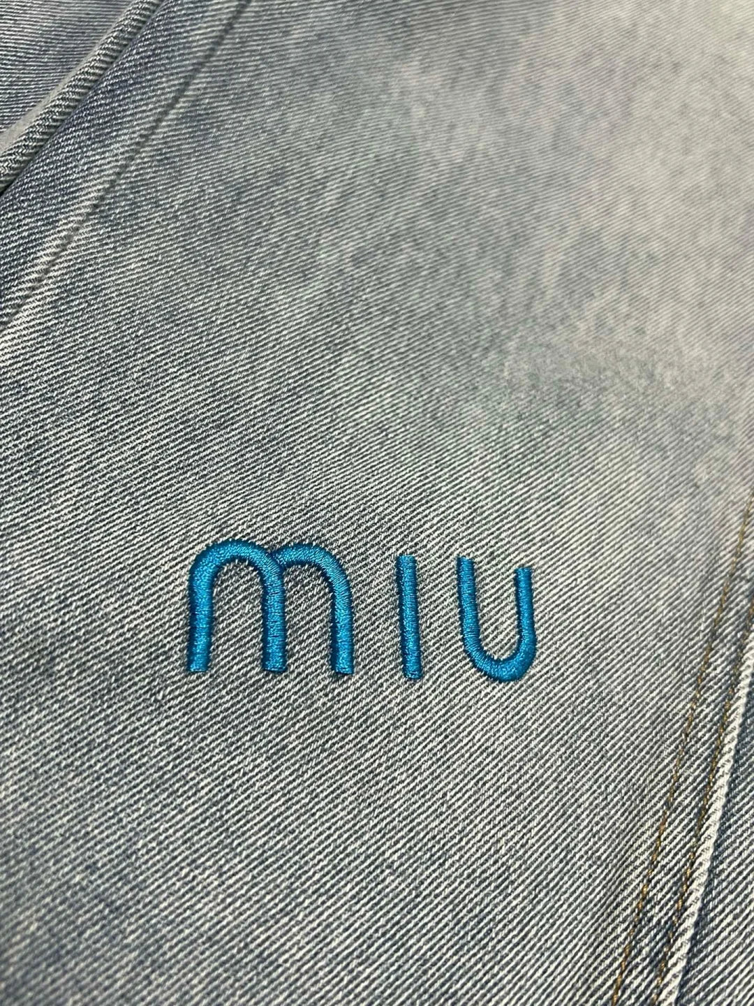 Blue embroidered lettering straight-leg jeans