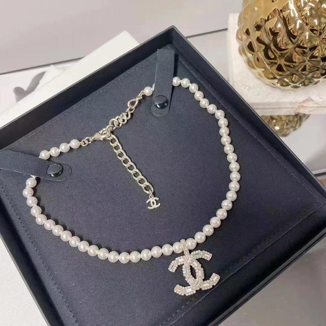 new pearl and diamond logo necklace