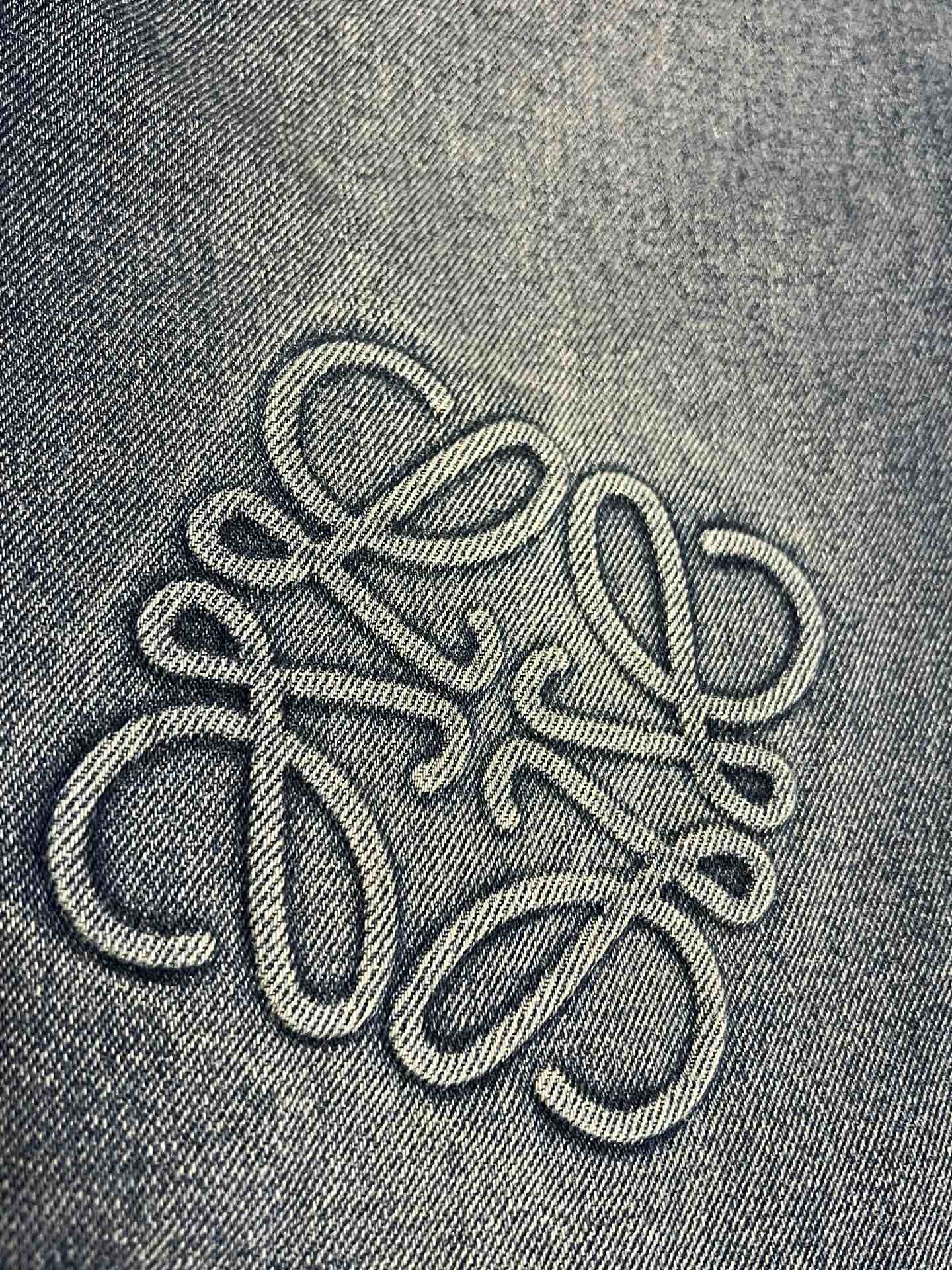 Embossed Logo Denim Trousers