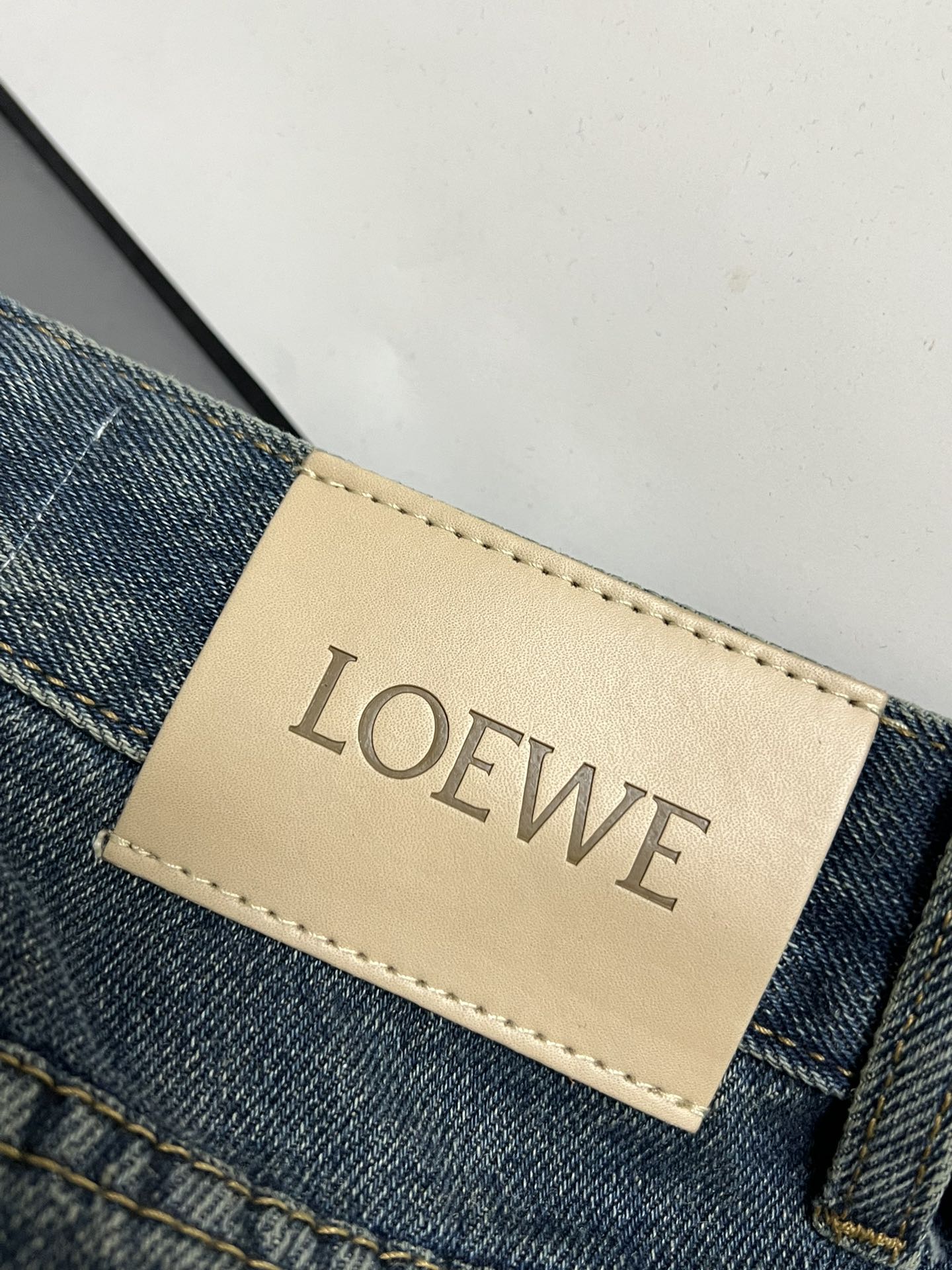 Embossed Logo Denim Trousers