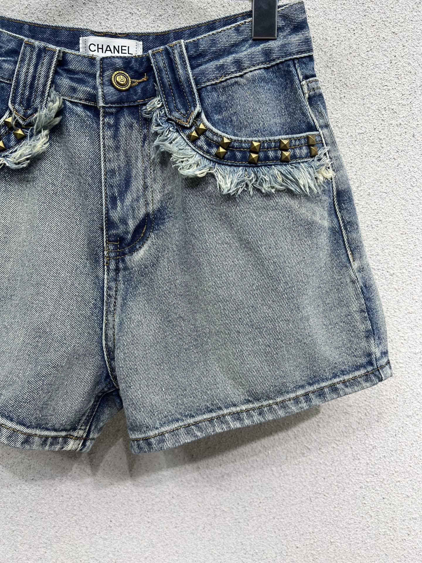 Studded denim shorts