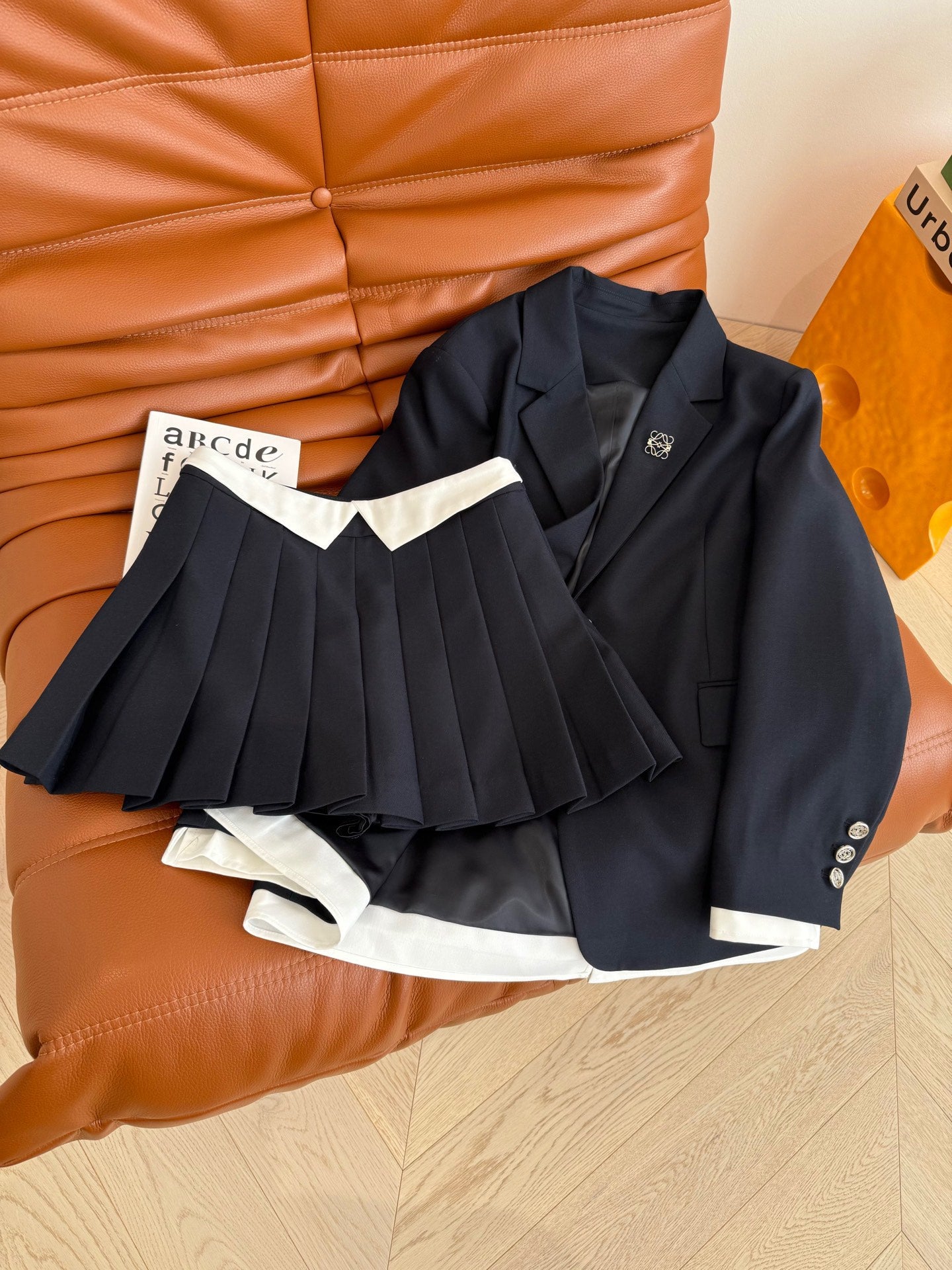 Colorblocked Design Jacket + Pleated Half Skirt