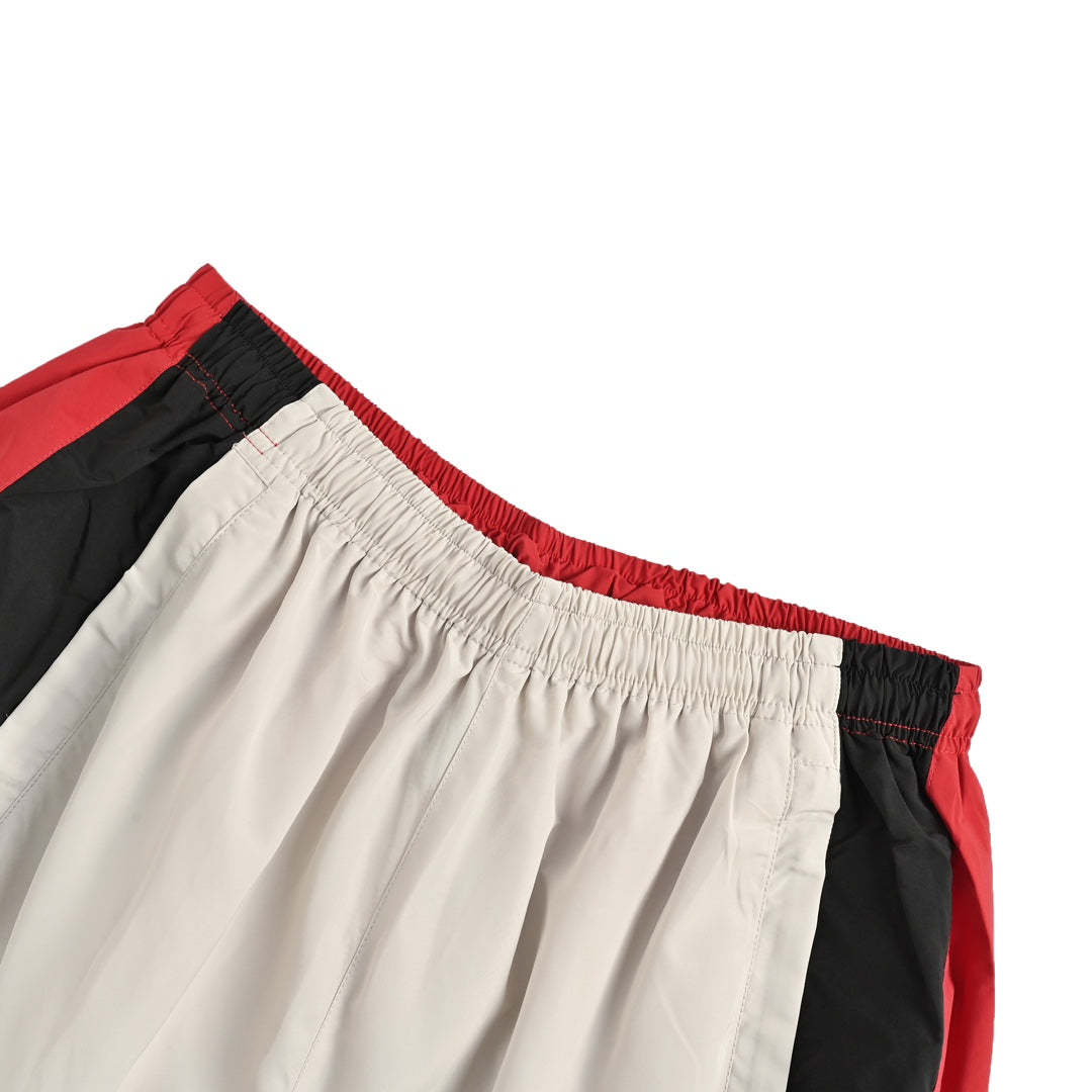 White and red stitching sports trousers