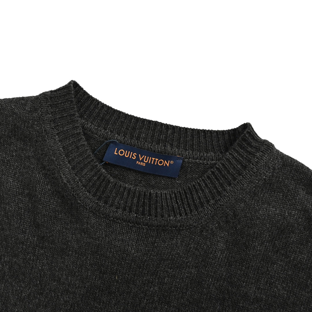 Wool knit sweater with jacquard cuffs