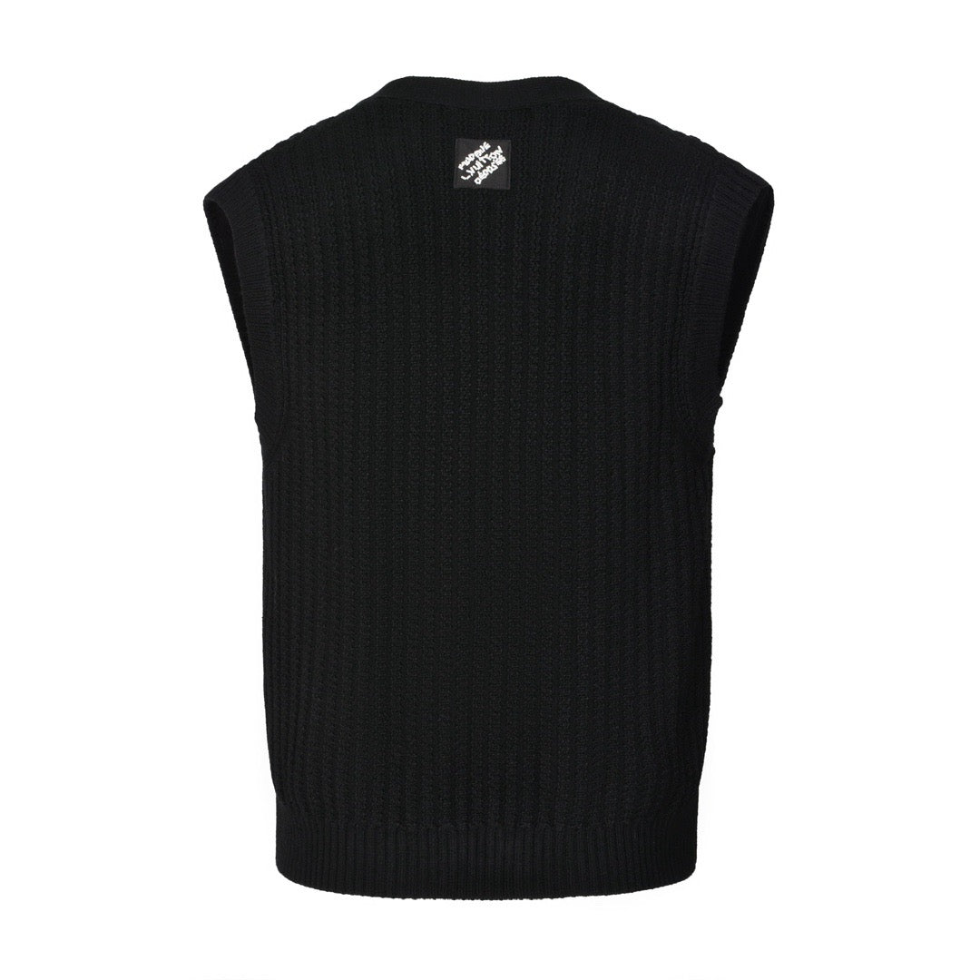 V-neck cable knit vest