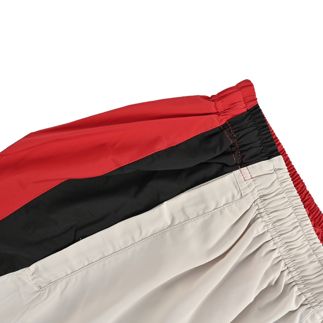 White and red stitching sports trousers